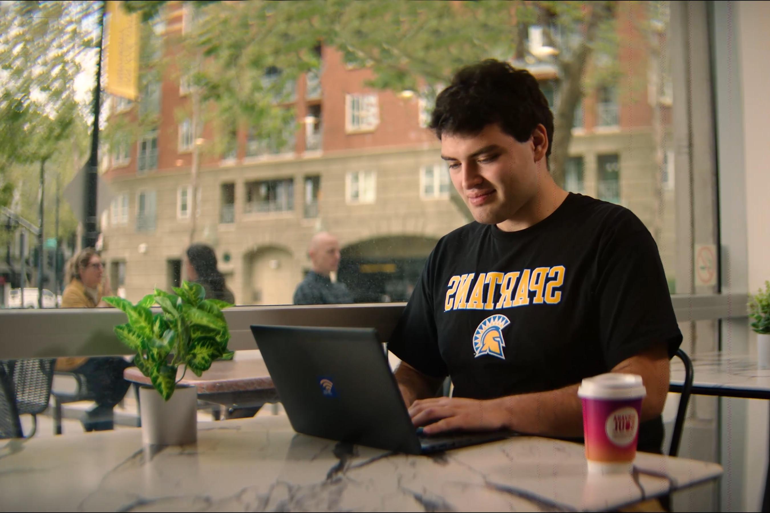 Student studying at a cafe